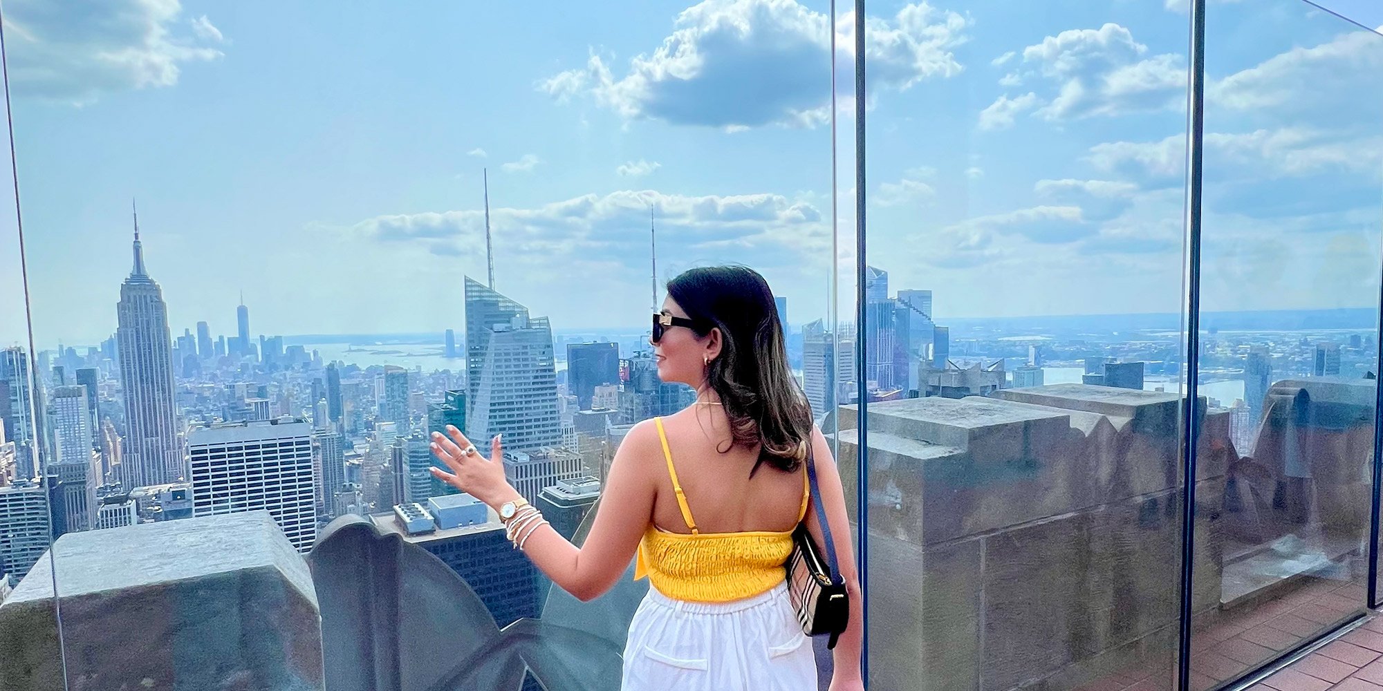 Woman at the Edge with NYC view